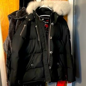 Women moose Knuckle jackets with white fire and detachable hood in a Size Large